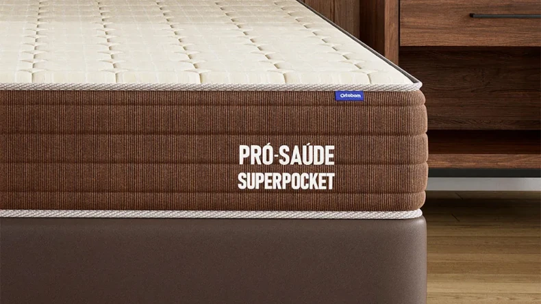 Colchão Pró Saúde Superpocket Casal com lateral na cor marrom e tecido bege na parte superior.
