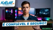Banner promocional com o logotipo do KaBuM! no canto superior esquerdo e a frase “É confiável e seguro?” em destaque. Ao centro, um homem com expressão de dúvida segura uma caixa de encomenda, com um computador gamer iluminado ao fundo.