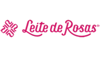 Logo apresente o nome da marca Leite de Rosas acompanhado por um ícone estilizado de uma rosa. Todos os elementos estão na cor rosa.