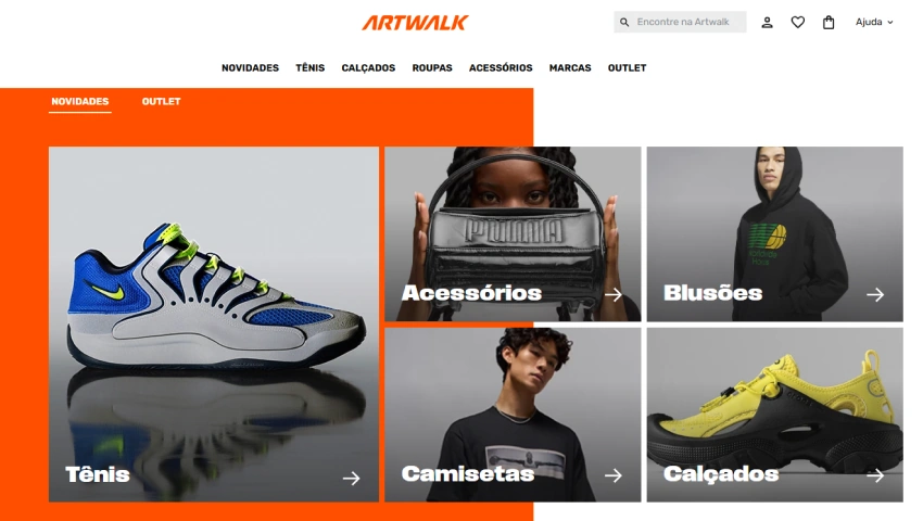 Homepage da Artwalk com categorias em destaque como Tênis, Acessórios, Blusões, Camisetas e Calçados. A imagem mostra produtos e modelos em destaque sob um layout moderno com tons laranja e cinza.