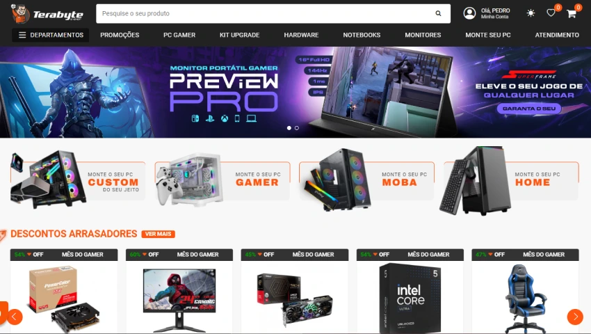 Página inicial do site da Terabyte Shop com banners promocionais, categorias como "Monte o seu PC Gamer" e destaques de produtos com descontos.
