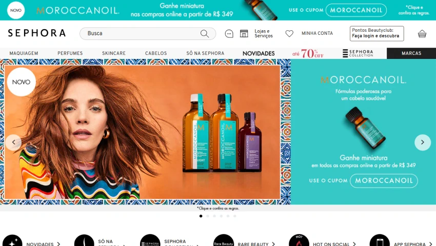 Página inicial da Sephora com uma mulher de cabelo cacheado e produtos de cuidados capilares Moroccanoil em destaque, promovendo o uso do cupom na plataforma.